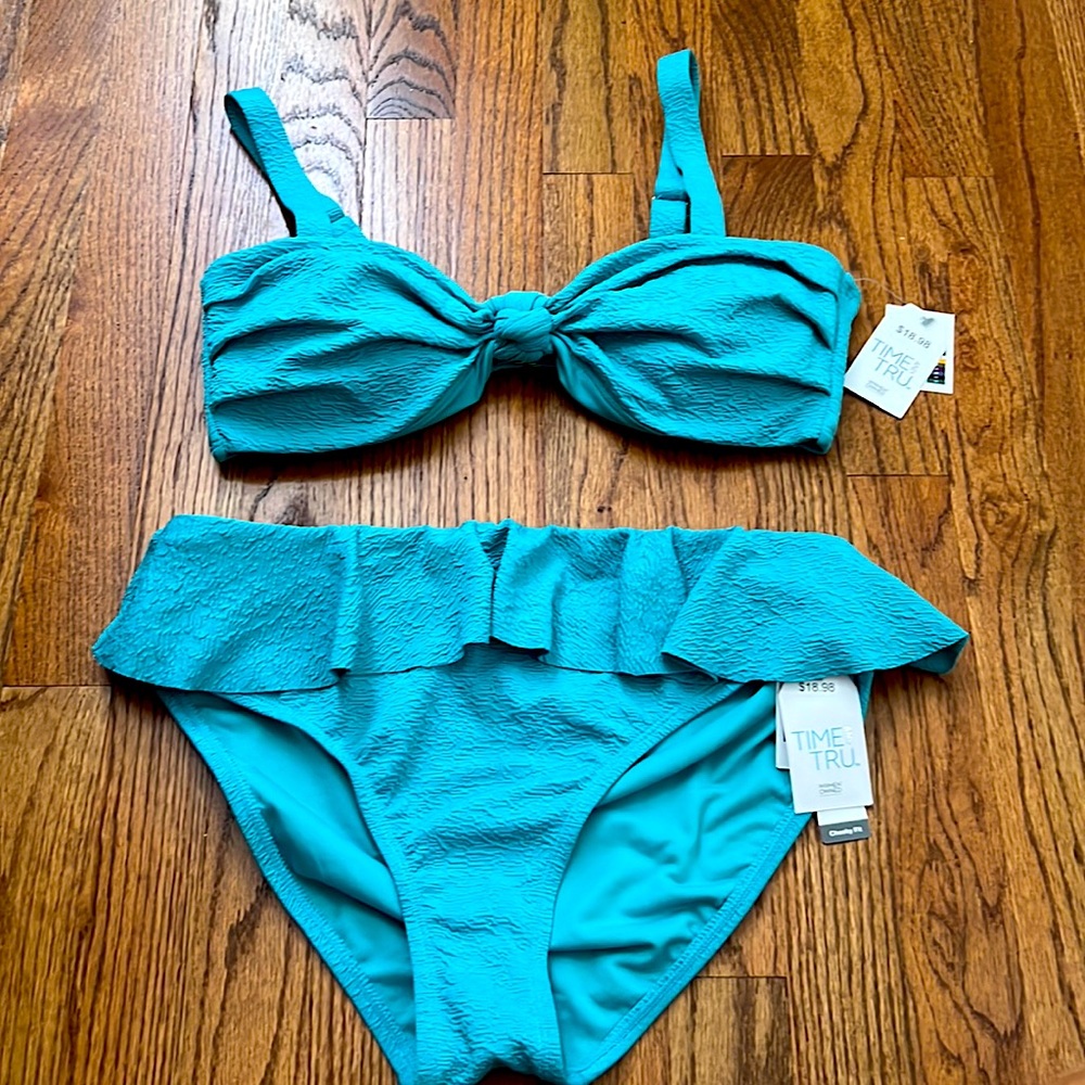 top and bottom both large. never worn. still has tags